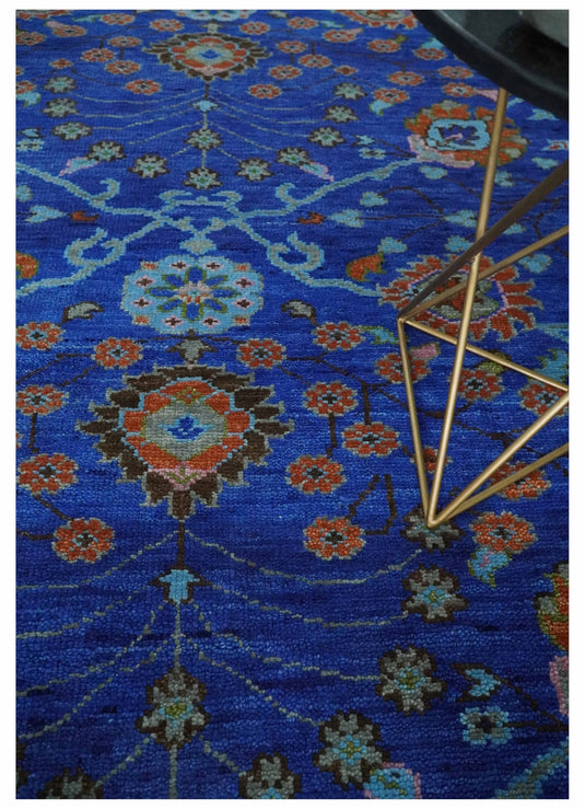 Hand knotted Traditional Floral Blue and Rust 9x12 wool Area Rug