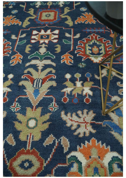 Traditional Pattern Blue, Rust and Ivory Hand Knotted 8x10 ft wool Area Rug