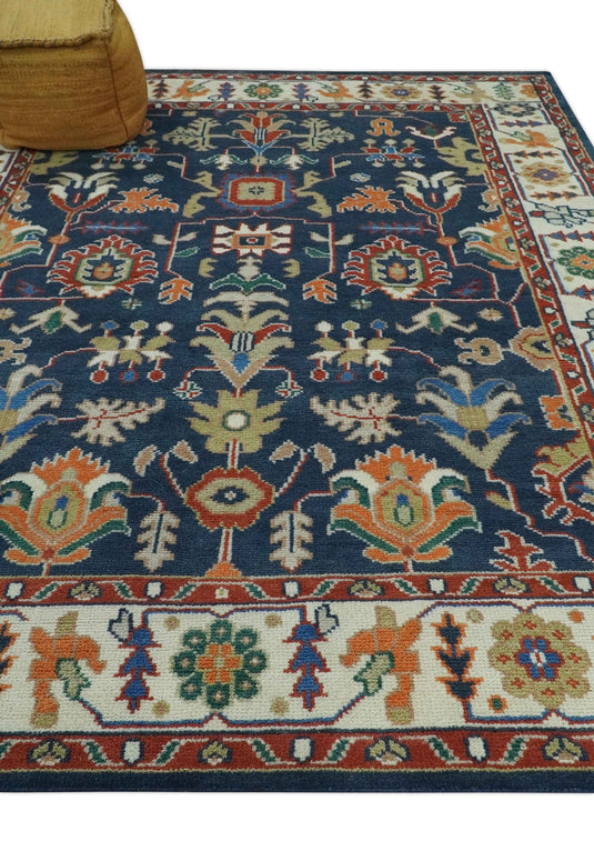 Traditional Pattern Blue, Rust and Ivory Hand Knotted 8x10 ft wool Area Rug