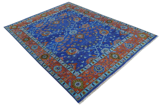 Hand knotted Traditional Floral Blue and Rust 9x12 wool Area Rug
