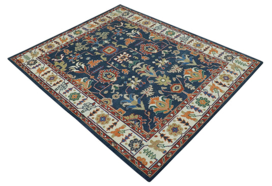 Traditional Pattern Blue, Rust and Ivory Hand Knotted 8x10 ft wool Area Rug