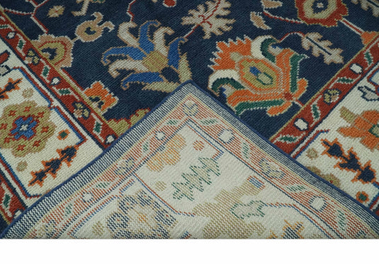 Traditional Pattern Blue, Rust and Ivory Hand Knotted 8x10 ft wool Area Rug