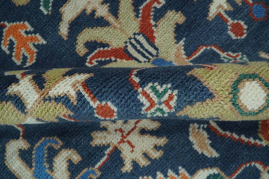 Traditional Pattern Blue, Rust and Ivory Hand Knotted 8x10 ft wool Area Rug