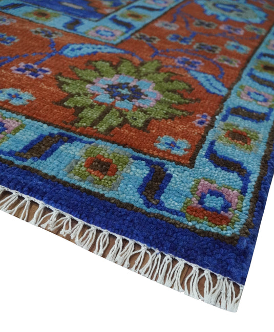 Hand knotted Traditional Floral Blue and Rust 9x12 wool Area Rug