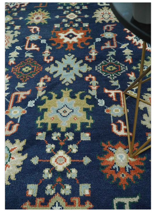 Traditional Pattern Blue, Rust, Ivory and Olive Hand Knotted 8x10 ft wool Area Rug