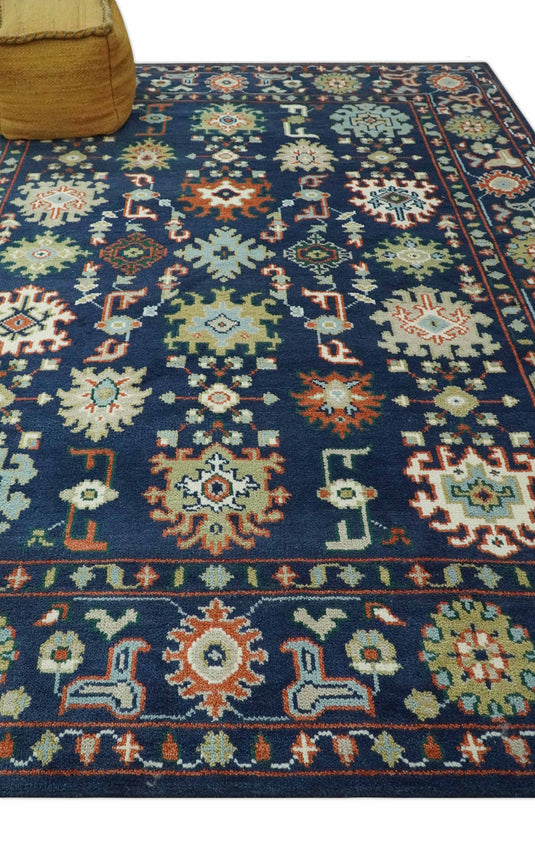 Traditional Pattern Blue, Rust, Ivory and Olive Hand Knotted 8x10 ft wool Area Rug