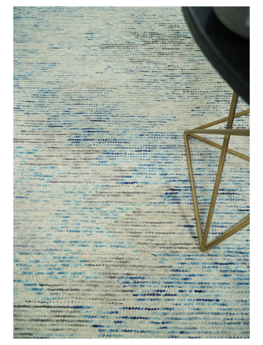 Custom Made Abstract Ivory, Blue, Charcoal And Beige Hand Tufted Wool Area Rug