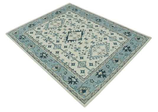 Custom Made Traditional Pattern Ivory, Blue and Dark Teal Hand Knotted wool Area Rug