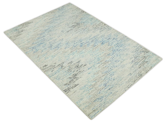 Custom Made Abstract Ivory, Blue, Charcoal And Beige Hand Tufted Wool Area Rug