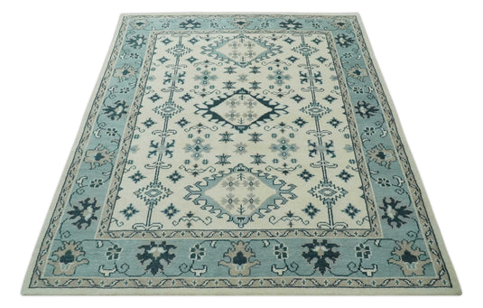 Traditional Pattern Ivory, Blue and Dark Teal Hand Knotted 8x10 ft wool Area Rug