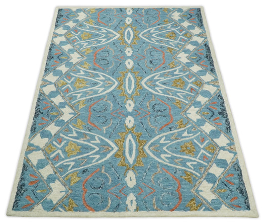 Custom Made Antique Blue And Ivory Hand Tufted Wool Area Rug