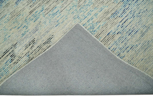 Custom Made Abstract Ivory, Blue, Charcoal And Beige Hand Tufted Wool Area Rug