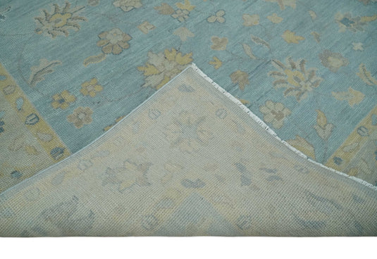 Custom Made Traditional Floral Hand Knotted Light Blue And Beige Wool Area Rug