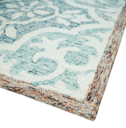 Custom Made Floral Pattern Blue, Rust, Aqua And ivory Hand Tufted Wool Area Rug