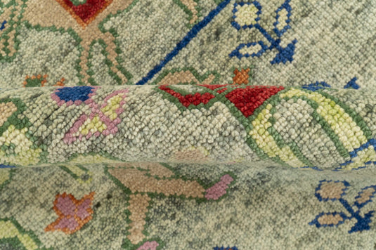 Custom Made Folk Art Green, Beige, Blue And Rust Hand Knotted Wool Area Rug
