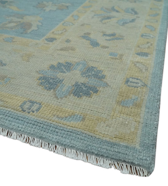 Custom Made Traditional Floral Hand Knotted Light Blue And Beige Wool Area Rug