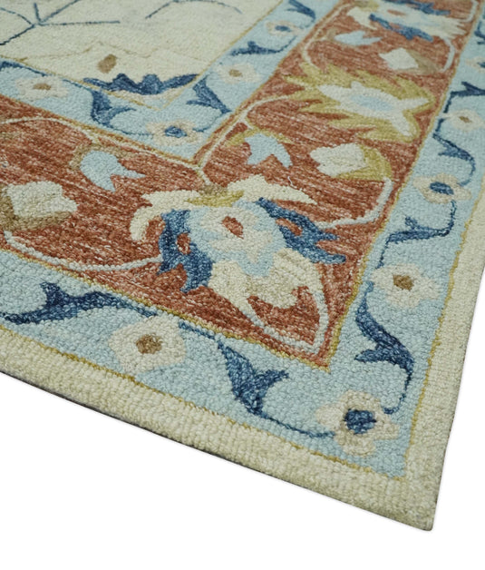 Custom Made Traditional Floral Blue, Silver, Ivory And Rust Hand Tufted wool Area Rug