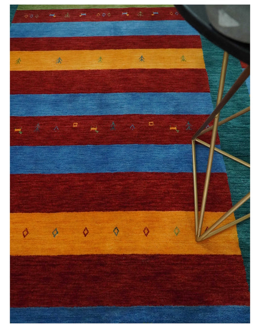 Hand Woven Vibrant Red, Blue, Yellow and Green Striped Wool southwestern Lori area rug, 6x8